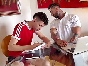 The English teacher gives an oral exam to his student.